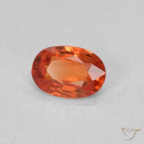 Zafiro Naranja rojizo natural de 0.54 ct, Ovalada, VS