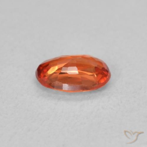 Zafiro Naranja rojizo natural de 0.54 ct, Ovalada, VS