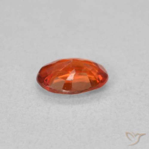 Zafiro Naranja rojizo natural de 0.48 ct, Ovalada, VS