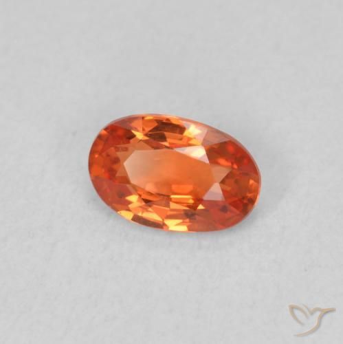 Zafiro Naranja rojizo natural de 0.53 ct, Ovalada, VVS-VS
