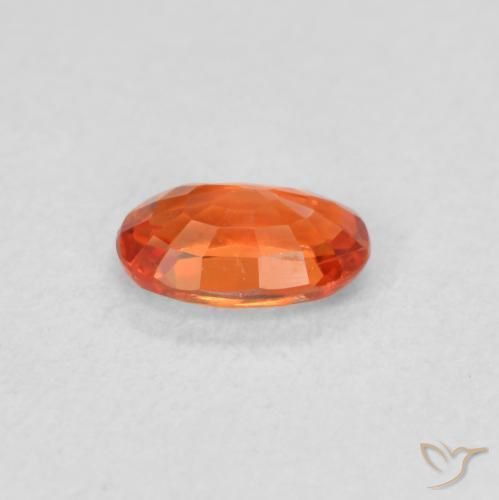 Zafiro Naranja rojizo natural de 0.53 ct, Ovalada, VVS-VS