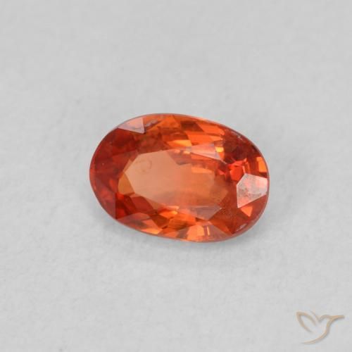 Zafiro Naranja rojizo natural de 0.57 ct, Ovalada, VS
