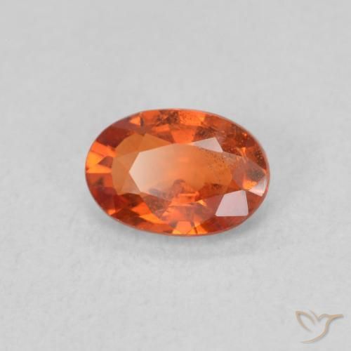 Zafiro Naranja rojizo natural de 0.65 ct, Ovalada, VS