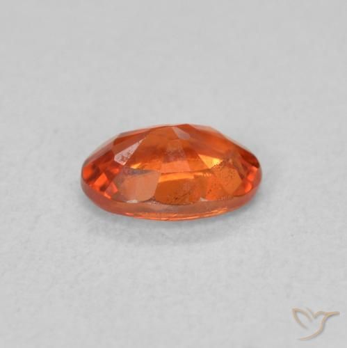 Zafiro Naranja rojizo natural de 0.65 ct, Ovalada, VS