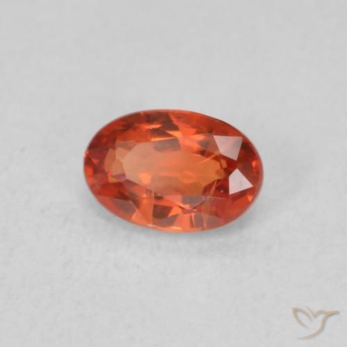 Zafiro Naranja rojizo natural de 0.71 ct, Ovalada, VS