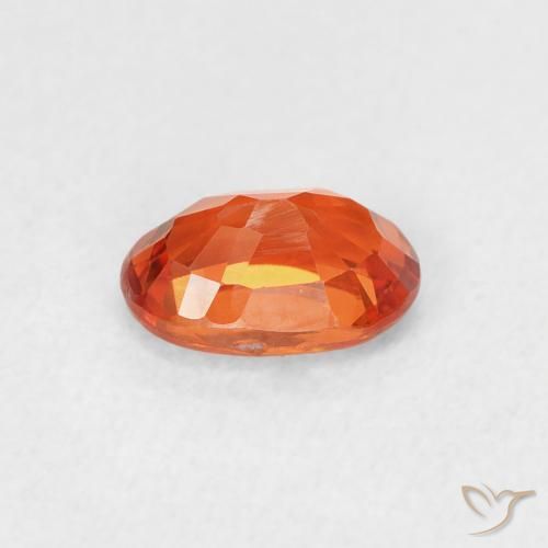 Zafiro Naranja rojizo natural de 0.71 ct, Ovalada, VVS