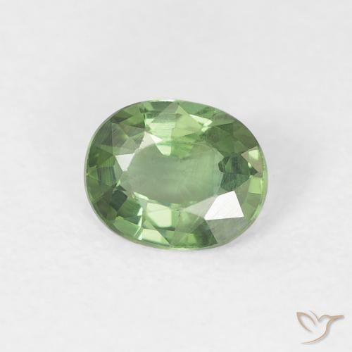 Zafiro Verde oscuro natural de 0.70 ct, Ovalada, VS