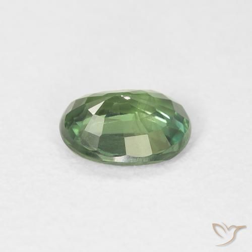 Zafiro Verde oscuro natural de 0.70 ct, Ovalada, VS