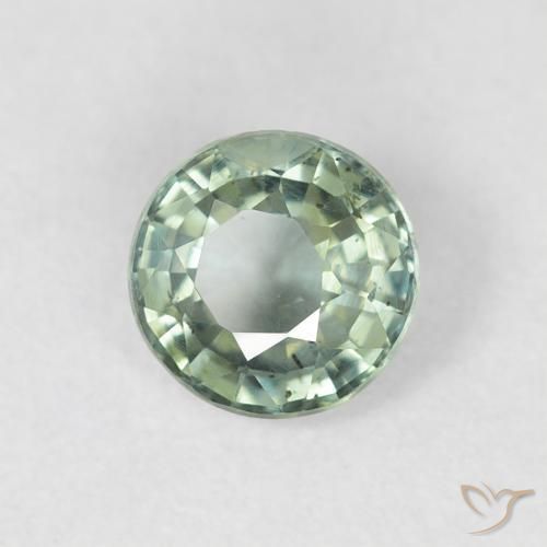 Zafiro Verde terroso natural de 0.79 ct, Redondo, VS