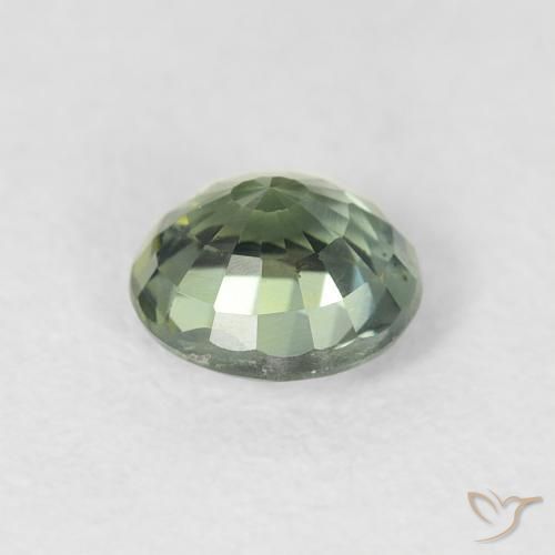 Zafiro Verde terroso natural de 0.79 ct, Redondo, VS
