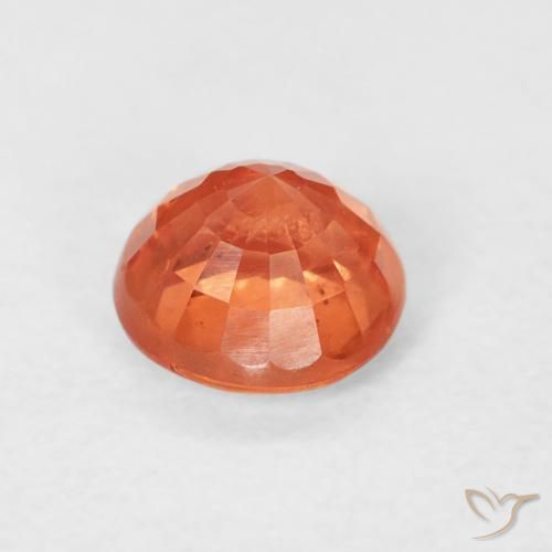 Zafiro Naranja rojizo natural de 0.87 ct, Redondo, VS
