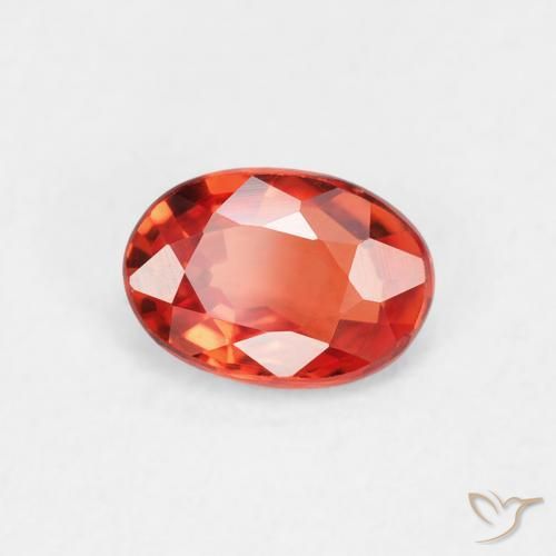 Zafiro Naranja rojizo natural de 0.61 ct, Ovalada, VVS-VS