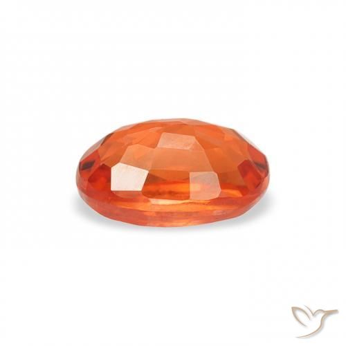 Zafiro Naranja rojizo natural de 0.76 ct, Ovalada, VS