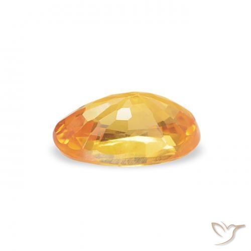 Zafiro Dorado naranja intenso natural de 0.60 ct, Ovalada, VS