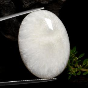 Scolecita blanco claro natural de 29,84 ct, corte óvalo, opaco