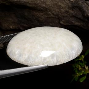 Scolecita blanco natural de 22,70 ct, corte óvalo, opaco