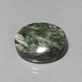 Serafinita verde natural de 9,89 ct, corte óvalo, opaco