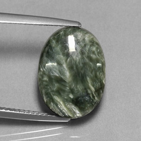 Serafinita verde natural de 9,89 ct, corte óvalo, opaco