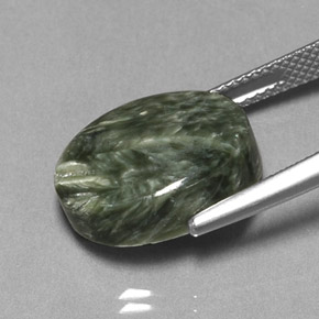 Serafinita verde natural de 9,89 ct, corte óvalo, opaco