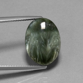 Serafinita verde natural de 7,83 ct, corte óvalo, opaco