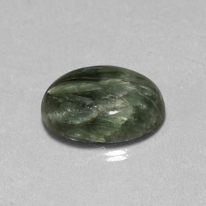 Serafinita verde natural de 4,57 ct, corte óvalo, opaco