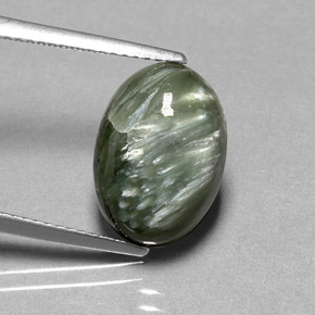 Serafinita verde natural de 4,86 ct, corte óvalo, opaco