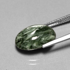 Serafinita verde natural de 5,05 ct, corte óvalo, opaco