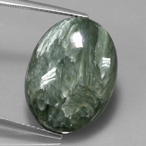 Serafinita verde natural de 11,47 ct, corte óvalo, opaco