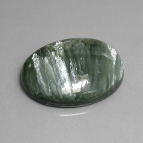 Serafinita verde natural de 11,82 ct, corte óvalo, opaco