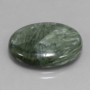 Serafinita verde natural de 10,47 ct, corte óvalo, opaco
