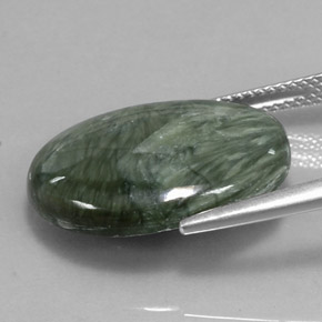 Serafinita verde natural de 10,47 ct, corte óvalo, opaco