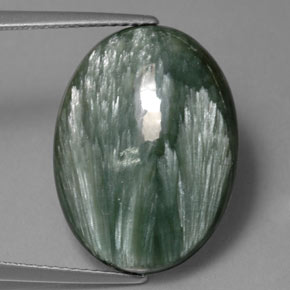 Serafinita verde natural de 11,40 ct, corte óvalo, opaco