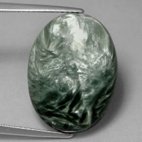 Serafinita verde natural de 10,79 ct, corte óvalo, opaco