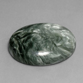 Serafinita verde natural de 10,79 ct, corte óvalo, opaco