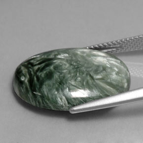Serafinita verde natural de 10,79 ct, corte óvalo, opaco