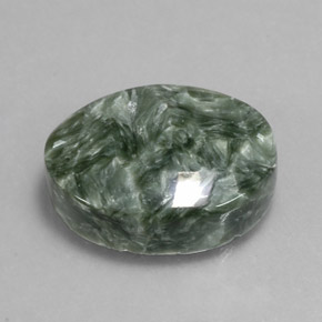Serafinita verde natural de 8,92 ct, corte óvalo, opaco