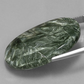 Serafinita verde natural de 37,48 ct, corte óvalo, opaco