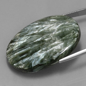 Serafinita verde natural de 54,47 ct, corte óvalo, opaco