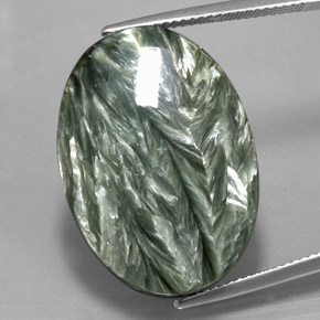 Serafinita verde natural de 24,96 ct, corte óvalo, opaco