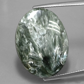 Serafinita verde natural de 21,31 ct, corte óvalo, opaco