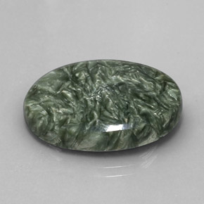 Serafinita verde natural de 19,04 ct, corte óvalo, opaco