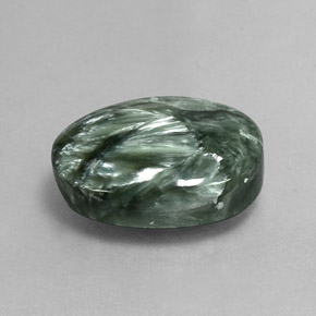 Serafinita verde natural de 8,64 ct, corte óvalo, opaco