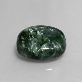 Serafinita verde natural de 7,60 ct, corte óvalo, opaco