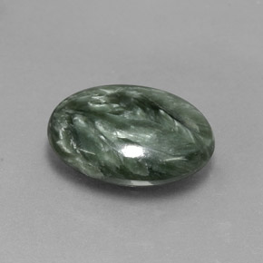 Serafinita verde natural de 6,39 ct, corte óvalo, opaco
