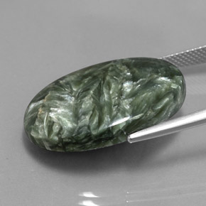 Serafinita verde natural de 20,23 ct, corte óvalo, opaco