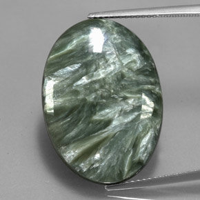 Serafinita verde natural de 17,29 ct, corte óvalo, opaco