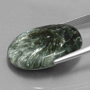 Serafinita verde natural de 21,95 ct, corte óvalo, opaco