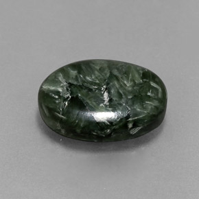 Serafinita verde natural de 5,06 ct, corte óvalo, opaco