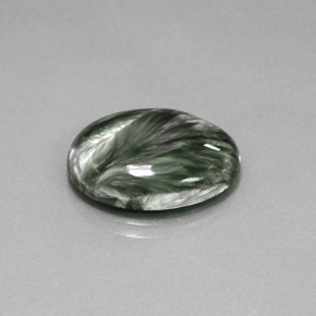 Serafinita verde natural de 9,42 ct, corte óvalo, opaco