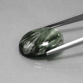 Serafinita verde natural de 9,42 ct, corte óvalo, opaco